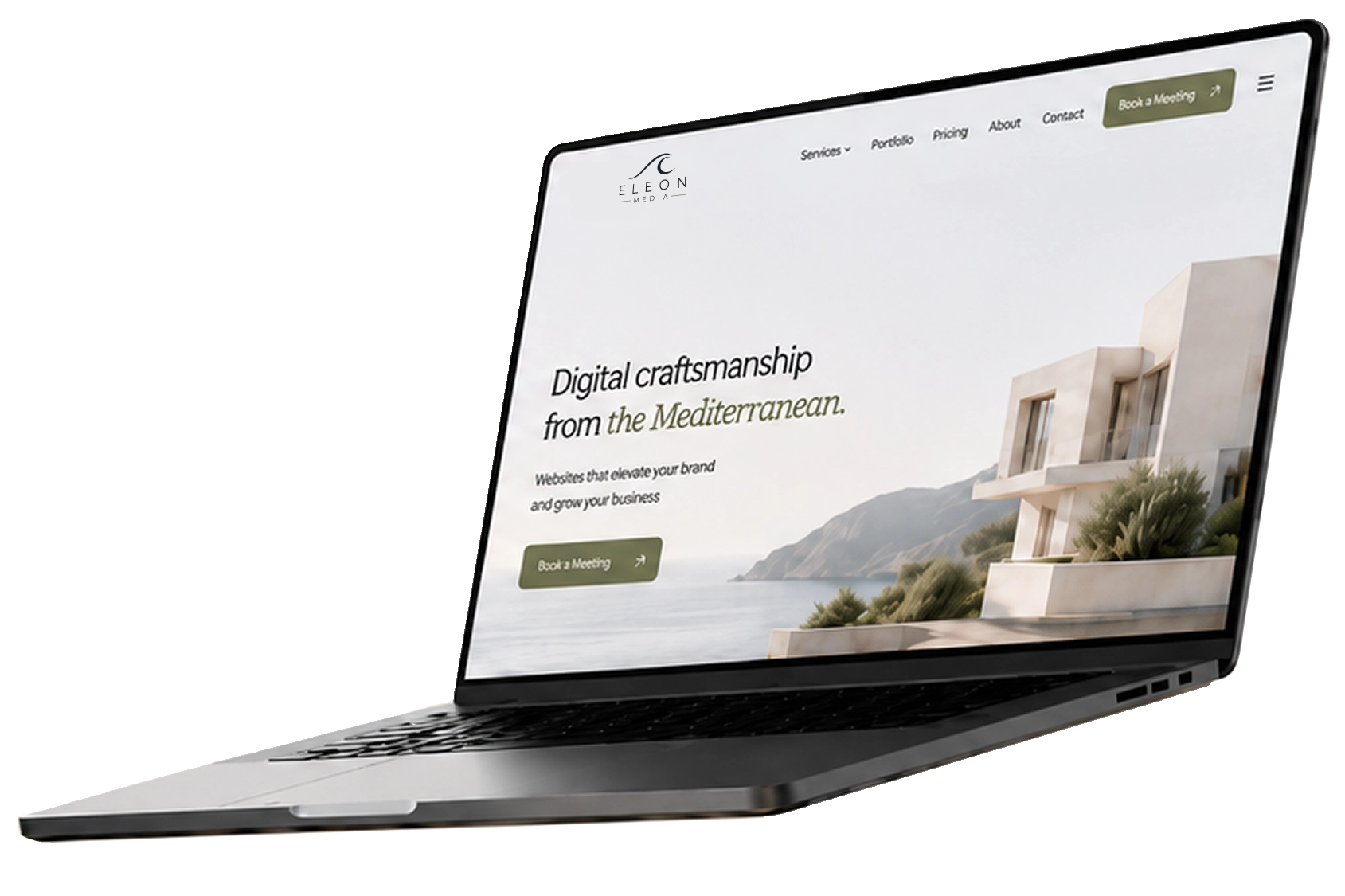 Laptop displaying a premium website homepage with a coastal villa image and the tagline "Digital craftsmanship from the Mediterranean"